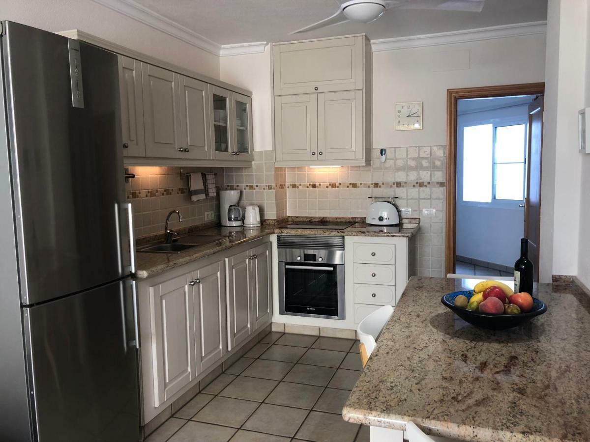 Apartamentos El Faro Пуэрто-Наос Экстерьер фото